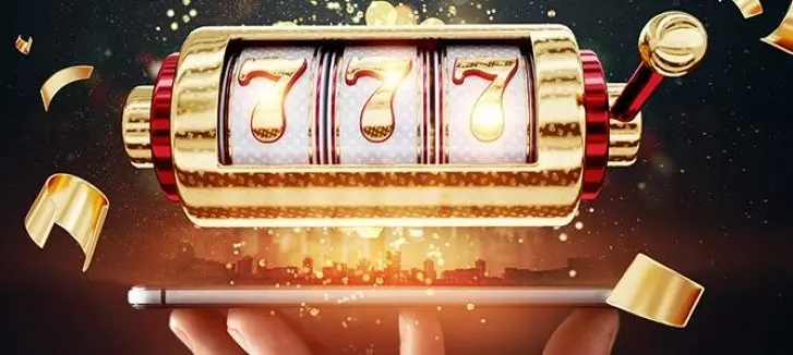 A person holding a phone with a 777 slots reel above it and gold confetti flying everywhere