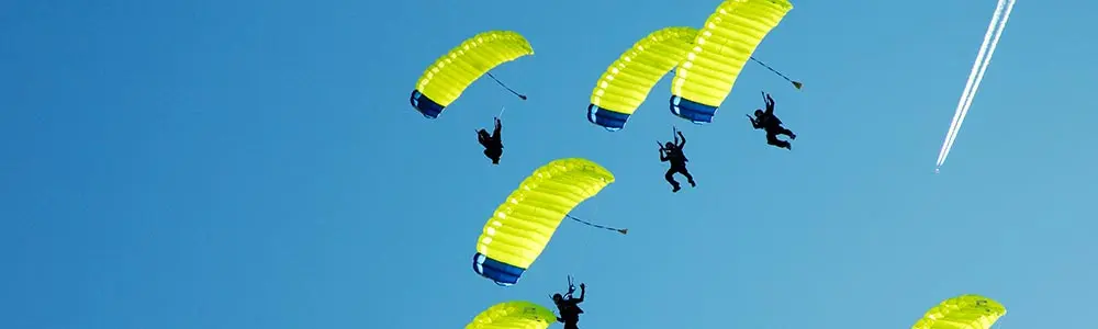 people having fun skydiving